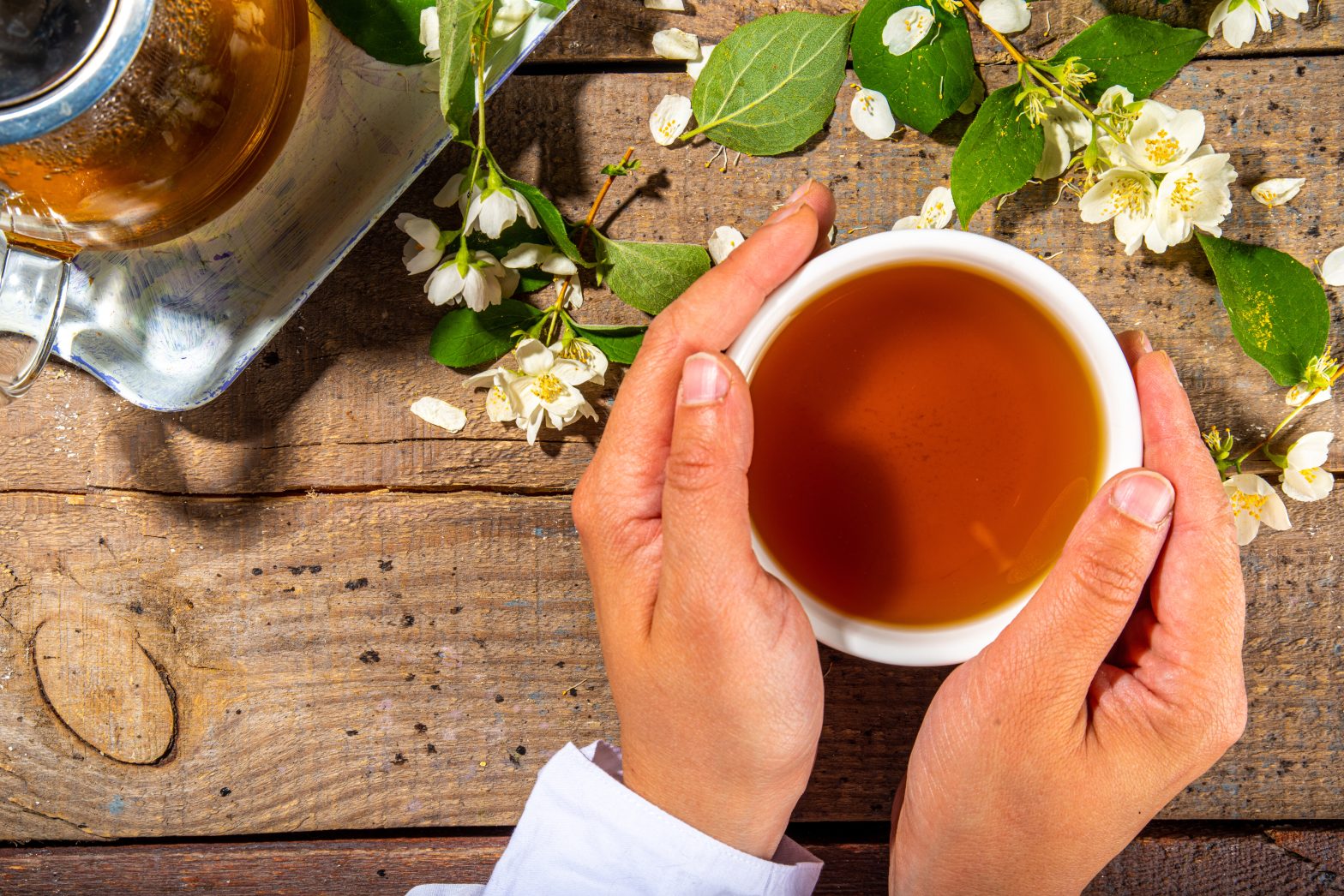Cup of Jasmine Tea and Flowers