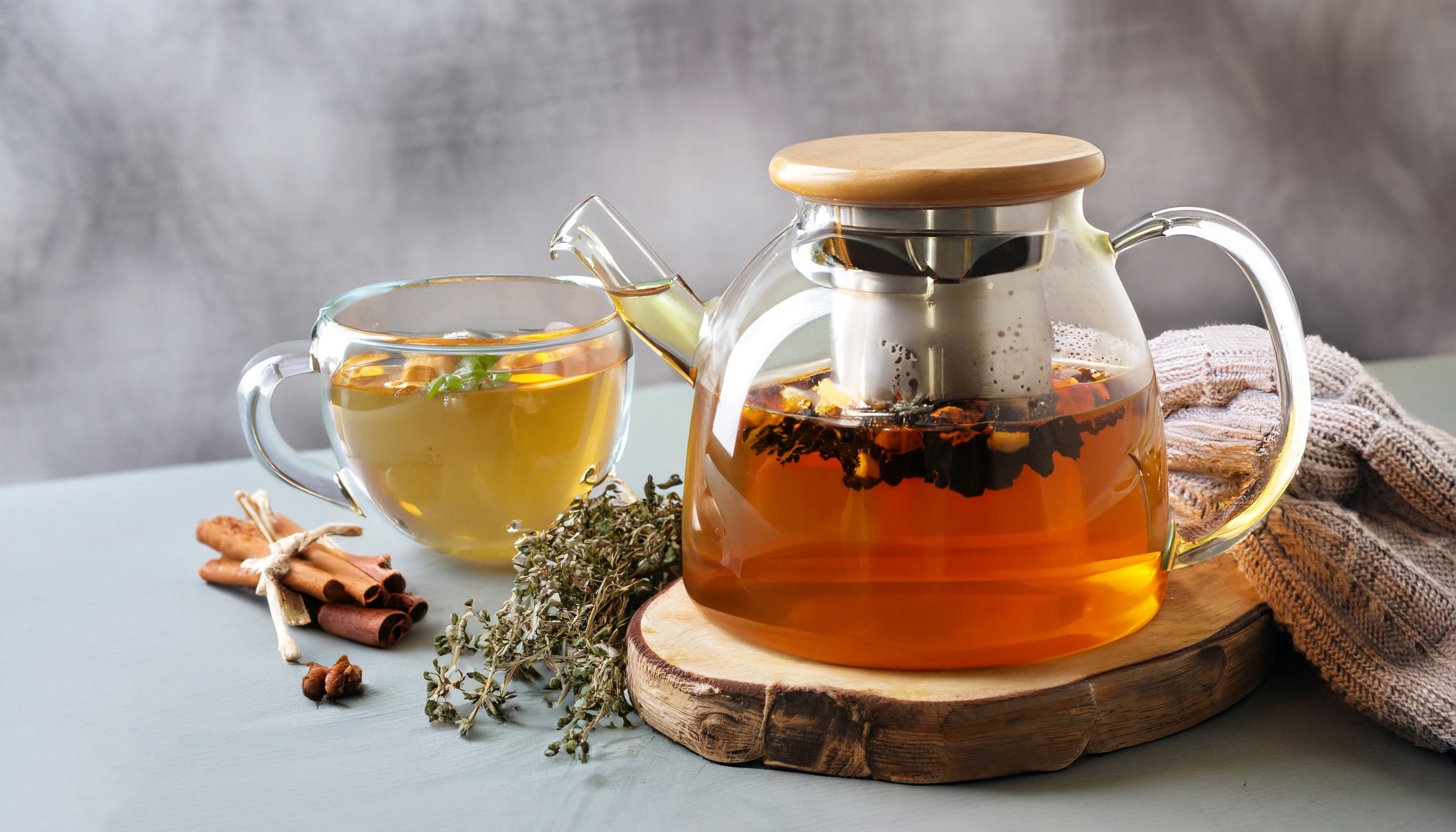 Pot and Cup filled with tea for winter season