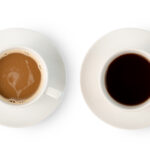 Milk Tea and black Tea in white cup isolated on white background